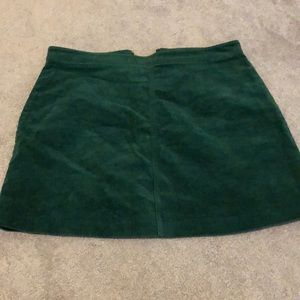 Green corduroy mini skirt